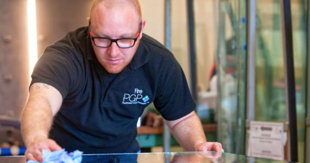 Skilled Worker Checking Glass